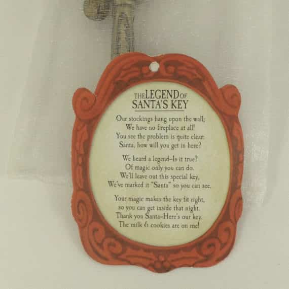 the-legend-of-santas-key-aged-brass-finish-holiday-story-jeweled-ornament