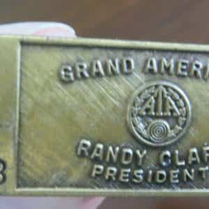 1983 GRAND AMERICAN ATA AMERICAN TRAP ASSOCIATION SHOTGUN SHELL PIN RANDY CLARK