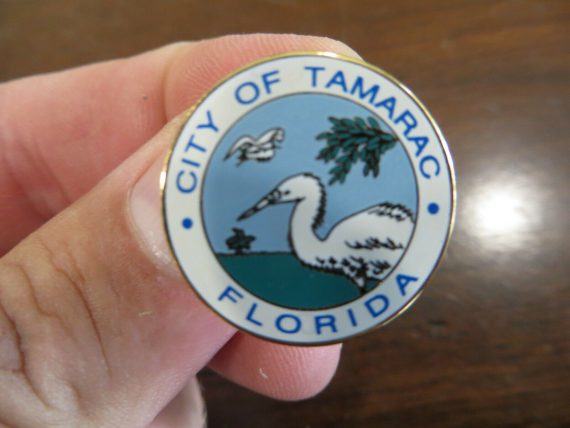 city-of-tamarac-florida-with-white-egret-crane-bird-souvenir-lapel-pin