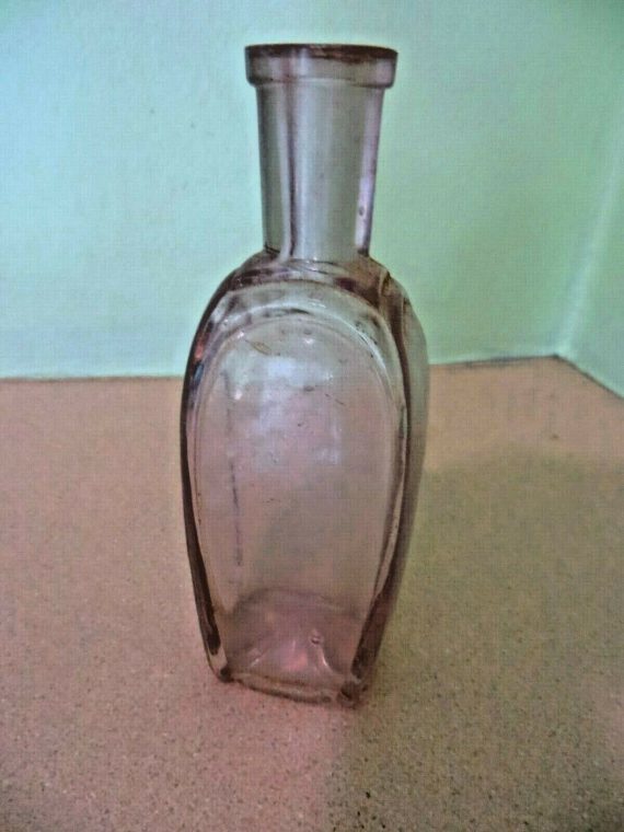 applied-lip-side-mold-seams-to-bottom-sheared-top-unknown-bottle