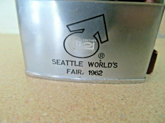 seattle-worlds-fair1962-century-21-expositions-penguin-flat-advert-lighter