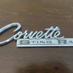 Corvette Sting Ray original car emblem P-3848316-C 4 1/2 X 1 1/4 INCHES CHROME