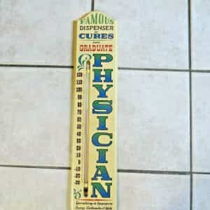 FAMOUS DISPENSER OF CURES AND GRADUATE PHYSICIAN 1967 WOODEN LARGE THERMOMETER