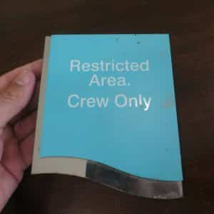 New Amsterdam cruise liner ship obsolete boat Restricted Area Crew Only sign