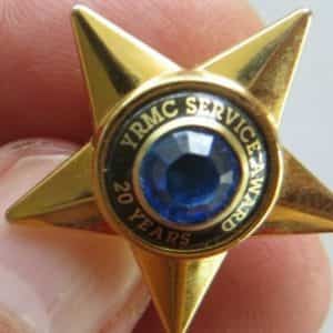 YRMC 20 YEARS OF SERVICE AWARD STAR WITH BLUE JEWEL,SOUVENIR  LAPEL PIN