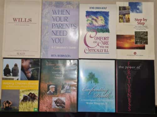 Books and DVDs LOT pertaining to death, caregiving, grief, wills, forgiveness