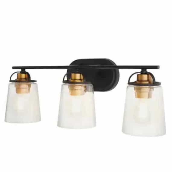 Home Decorators Collection 1021HDCABDI Goddard 23.1825 in. 3-Light Bronze with Vintage Brass Industrial Bathroom Vanity Light Accents and Clear Seeded Glass