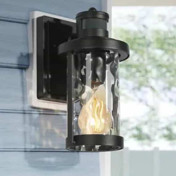 Uolfin 628G8UEFAJR4744 Modern Black Outdoor Wall Light 1-Light Motion Sensor Wall Lantern Sconce with Water Rippled Glass Shade (1-Pack)