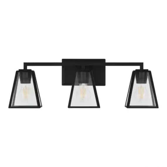home-decorators-collection-1029hdcmbdi-mackenzie-place-24-in-3-light-matte-black-bathroom-vanity-light-with-clear-glass-shades