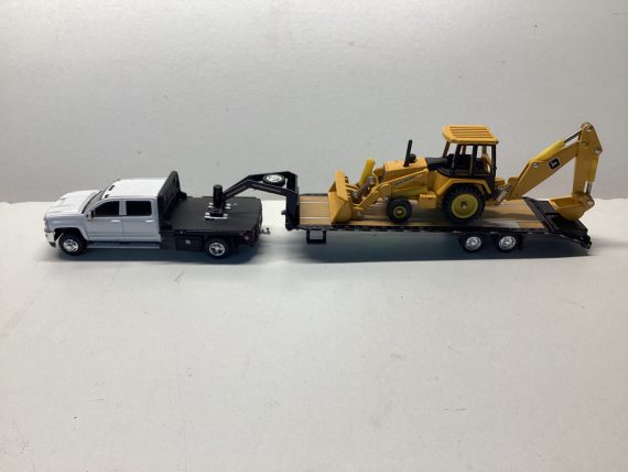 Truck and backhoe