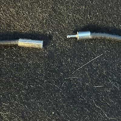 faux-silver-elephant-with-faux-diamonds-necklace-on-black-rope