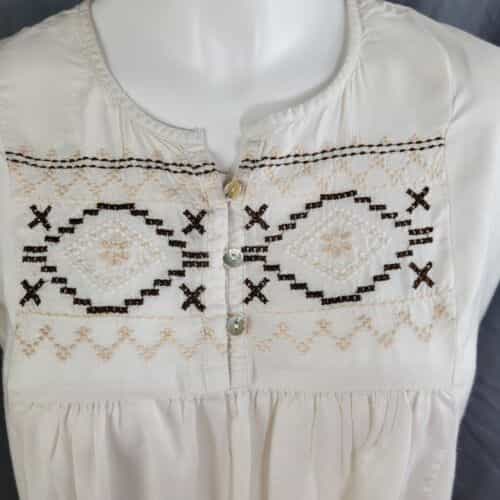 sweet-magnolia-pleated-front-embroidered-blouse