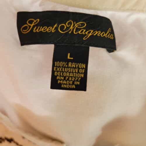 sweet-magnolia-pleated-front-embroidered-blouse