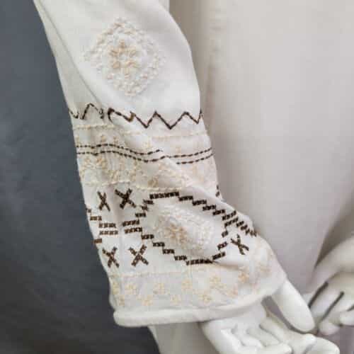 sweet-magnolia-pleated-front-embroidered-blouse