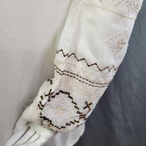 sweet-magnolia-pleated-front-embroidered-blouse