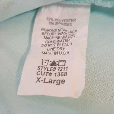 flair-mint-ruffle-bottom-sleeveless-blouse