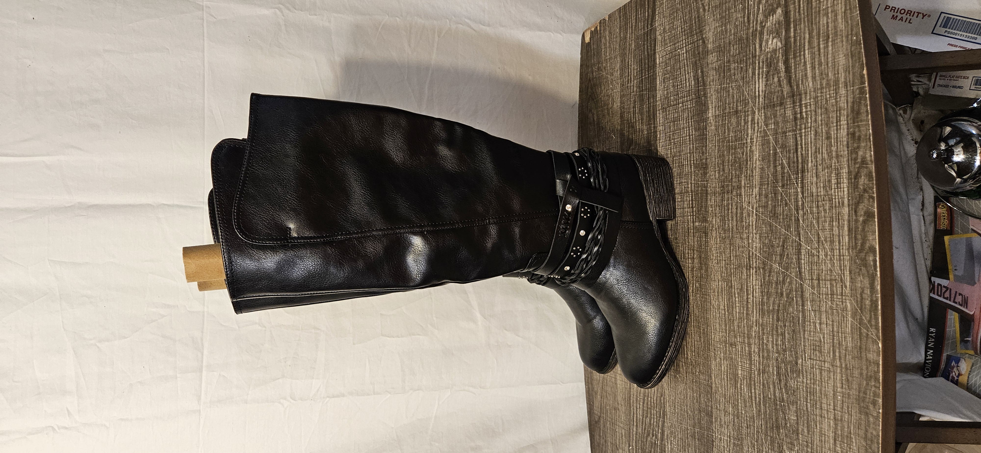 womens-black-knee-high-riding-boots-size-6-5-features-braided-and-studded-strap-details-around-the-ankle-inside-zip-up-closure-excellent-used-condition-item-3469